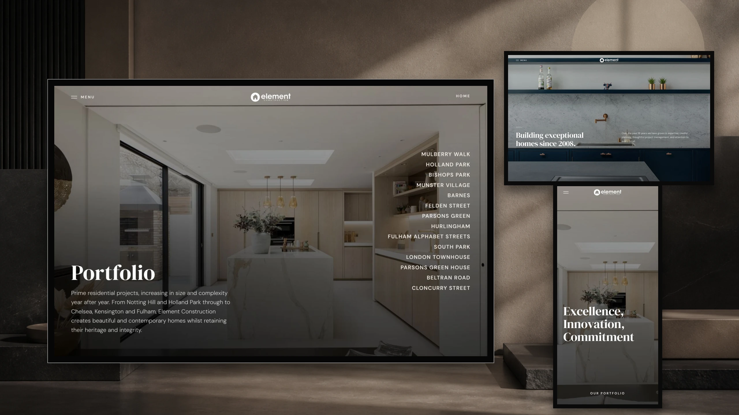 Element Construction portfolio displayed on a laptop in an editorial interior